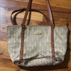 Michael Kors Brown and Tan Logo Tote, used in good condition, has scuff/pen